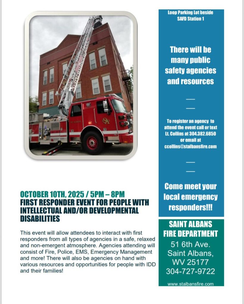 St. Albans Fire Department ladder truck extended beside Station 1 promoting the First Responder Event for people with Intellectual and Developmental Disabilities.